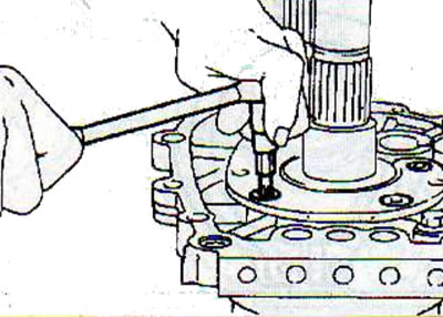 Apply locking compound to the threads of the main shaft bearing retaining plate mounting bolts,…