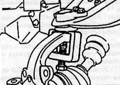 Remove the cotter pin, unscrew the nut and use the KM-787 puller to remove the upper ball joint…