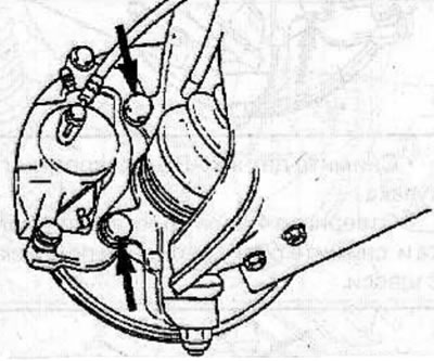 Install the caliper on the left steering knuckle and secure with 2 bolts, tightening them to a…