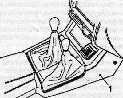 Remove the center console (1) (see the relevant chapter).