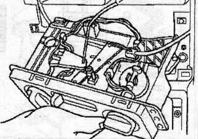 Remove the screws, pull the heating and ventilation control unit out of the instrument panel and…