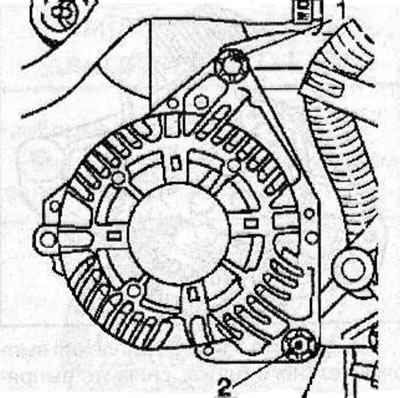 Unscrew the nut from the lower generator mounting bolt (2), but do not remove the bolt yet.