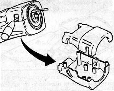 Remove the screws and steering column covers.