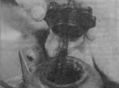 1. The fluid level is checked with a dipstick attached to the filler cap of the reservoir. The…