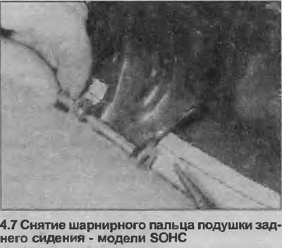 7. To remove the pivot pin, remove the retaining ring from the end of the pin and remove the pin…