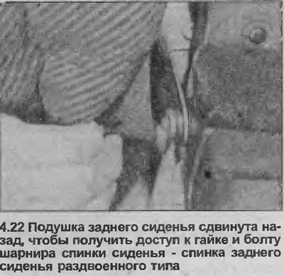 22. Working on the center pivot of the seat back in two halves, push the seat cushion away from the…