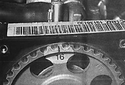 2. To access the timing mark on the camshaft pulley, remove the upper timing belt cover.
