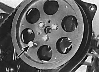 4. To determine whether piston number one or number four is at top dead center, check the alignment…