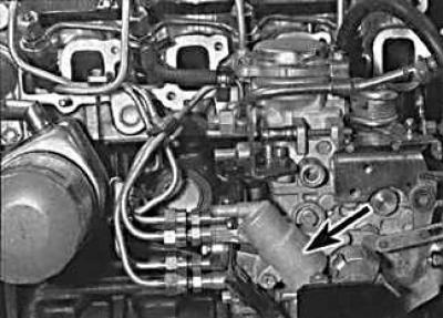 4. Remove the accelerator cable from the fuel pump.