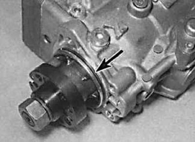 5. Unscrew the bolts (indicated by arrows) and remove the mounting bracket from the rear of the…