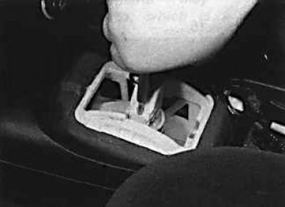 1. Loosen the shift rod clamp bolt, but do not remove it completely.