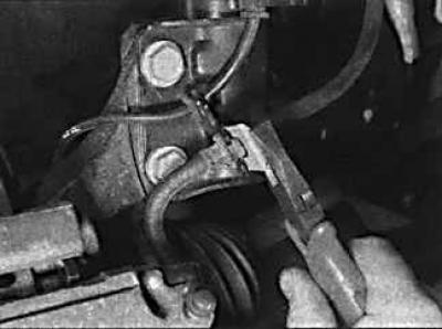 3. While continuing to press the pedal, force the fluid in the system together with the air through…