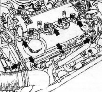 9.13 The camshaft housing cover mounting bolts are indicated by arrows (z19DT engine)