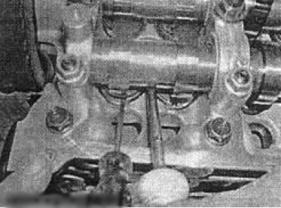 9.19 It is best to remove the adjusting washer using a magnetized rod