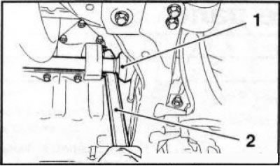 2.10 Removing the right drive shaft (1) from the splined connection with the intermediate shaft…