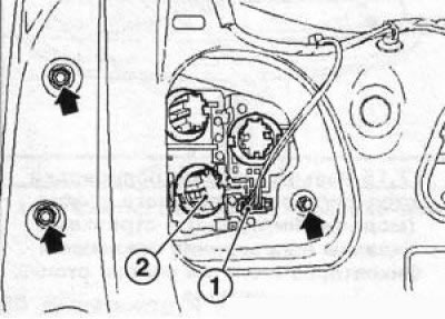 16.12 Nuts (indicated by arrows) fastening the rear combination light section to the tailgate…