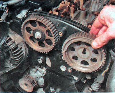 8. Remove the pulley by sliding it along the camshaft flange.
