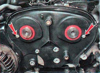 10. Using a TORX T30 key, unscrew the two upper bolts securing the rear cover.