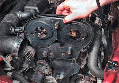 13. Remove the rear timing belt cover.