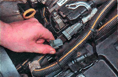 5. Disconnect the gray wiring harness connector.