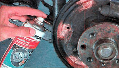 15. Apply a special high-temperature lubricant to the contact points of the brake pads with the…