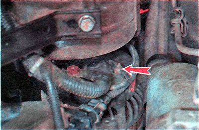 3. Using an 8 mm wrench, unscrew the nut...