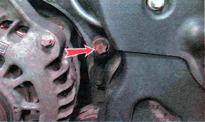 ...and to the cylinder head and remove the bracket.