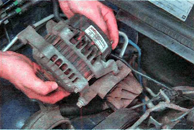 ...and remove the generator assembly with the lower bracket.