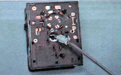 1. Using a slotted screwdriver, turn the lamp holder counterclockwise and remove the lamp assembly…