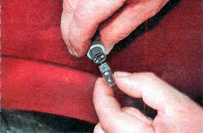 3. Remove the faulty lamp from the socket and replace it.