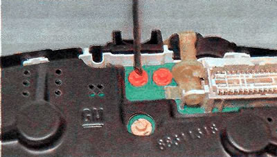 2. Using tweezers or a thin slotted screwdriver, turn the lamp socket counterclockwise and remove…
