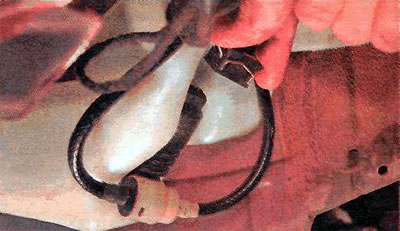 3. Disconnect the wiring harness connector from the pump.