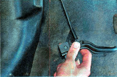 8. Disconnect the bracket from the body by moving it back.