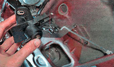 5. Move the switch (cylinder) away from the door and turn it slightly to disconnect the lock rod…