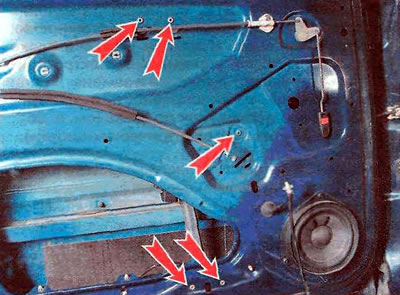 4. Using a 10 mm drill, drill out five rivets that secure the window lift mechanism.